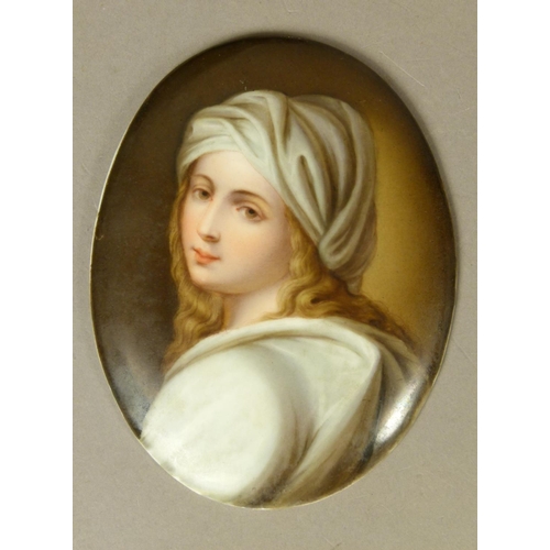 257 - A 19TH CENTURY OVAL PORCELAIN MINIATURE FEMALE PORTRAIT, head and shoulders, long blonde tresses, we... 