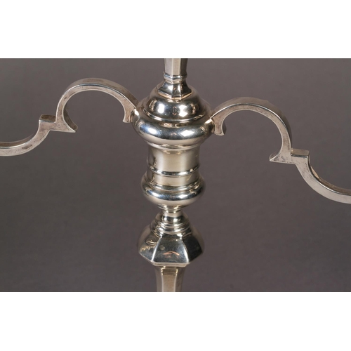 274 - A PAIR OF GEORGE II STYLE SILVER TWO BRANCH THREE LIGHT CANDELABRUM with knopped octagonal stems and... 