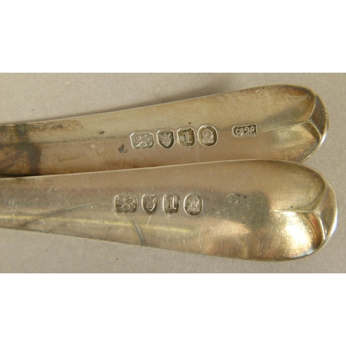 284 - A PAIR OF GEORGE III SILVER TABLE SPOONS, Old English pattern, dog tooth and wrigglework borders, in... 