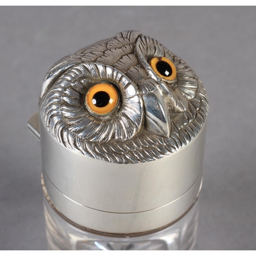 287 - A LATE VICTORIAN SILVER TOP JAR, the hinged lid finely embossed and engraved with an owl mask, yello... 