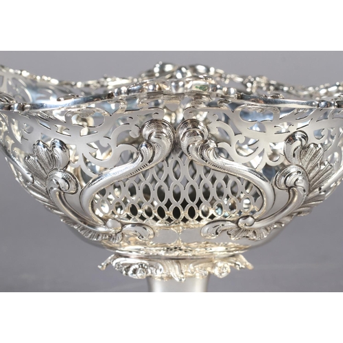 290 - A SILVER PEDESTAL BASKET, pierced cast and chased, the oval body with foliate clasped border and ova... 