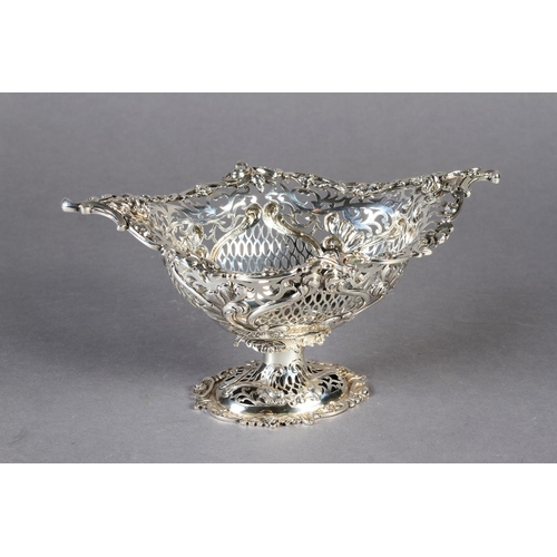 290 - A SILVER PEDESTAL BASKET, pierced cast and chased, the oval body with foliate clasped border and ova... 