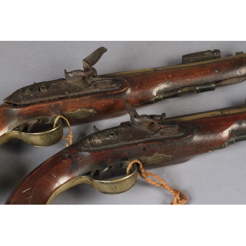 32 - A PAIR OF MARINE FLINTLOCK PISTOLS by Goodison, London, full stocked with signed stepped locks, bras... 