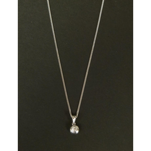 323 - A DIAMOND PENDANT IN 18CT WHITE GOLD, the brilliant cut stone bubble set below pendant loop hung fro... 