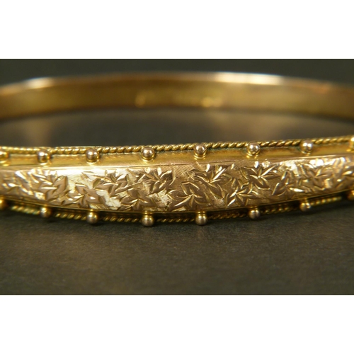 361 - A VICTORIAN STIFF HINGED BANGLE in 9ct rose gold by Peyton Pepper Ltd, Birmingham 1898, tapered and ... 