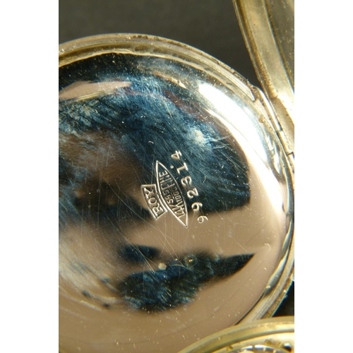 374 - ART DECO POCKET WATCH BY TRAVANNES in an open faced 14ct gold case No 992314 with foliate scroll eng... 