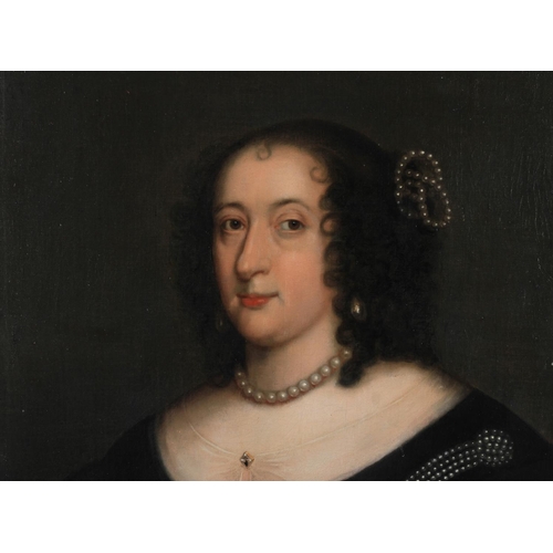 381 - FOLLOWER OF SIR ANTHONY VAN DYCK, Lady Higgins, half-length, wearing a black dress and string of pea... 