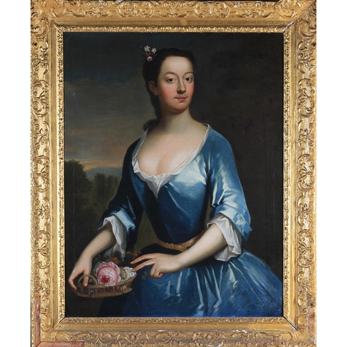 387 - ATTRIBUTED TO SIMON VERELST (1644-1721) Portrait of a lady, three-quarter length, wearing a blue gow... 