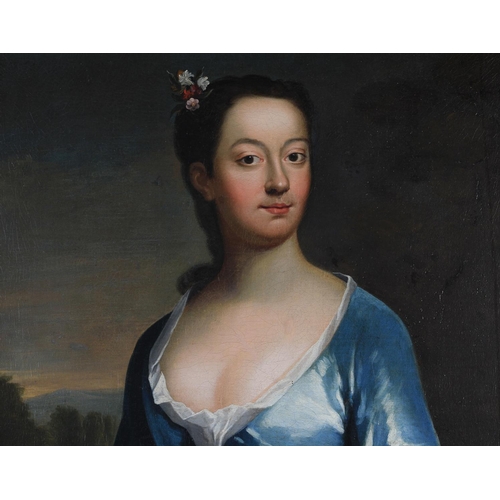 387 - ATTRIBUTED TO SIMON VERELST (1644-1721) Portrait of a lady, three-quarter length, wearing a blue gow... 