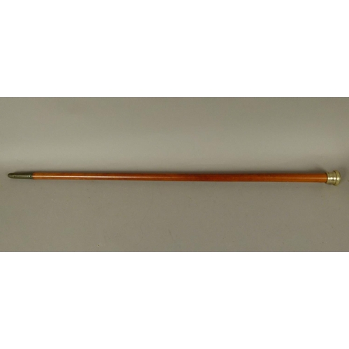 41 - A TAPERED HARDWOOD WALKING STICK with twisted shaft, silver collar and boar's tusk handle, brass fer... 