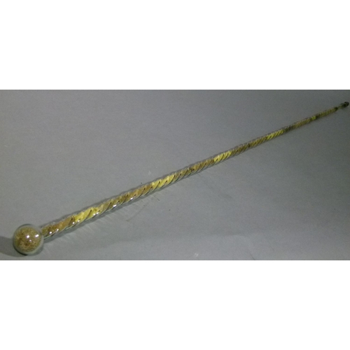 44 - A VICTORIAN SPIRAL MOULDED GLASS WALKING CANE with spherical pommel, internally decorated with alter... 