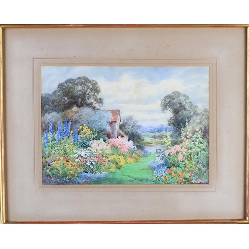 448 - THERESA SYLVESTER STANNARD (1898-1947)  The Old Mill Garden, watercolour, signed lower left, 24cm x ... 