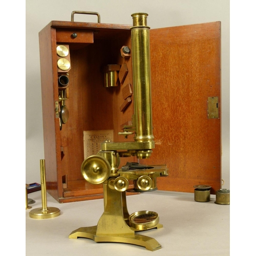 48 - A 19TH CENTURY BRASS MICROSCOPE BY C. BAKER OF LONDON, complete with lenses, magnifier and drawer of... 