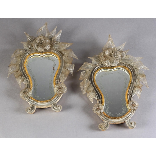 483 - A PAIR OF VENETIAN GLASS STRUT-BACKED SMALL MIRRORS, wheel engraved plates, each of waisted oval for... 