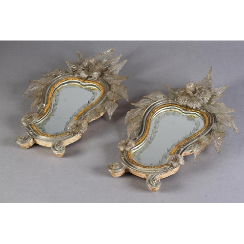 483 - A PAIR OF VENETIAN GLASS STRUT-BACKED SMALL MIRRORS, wheel engraved plates, each of waisted oval for... 