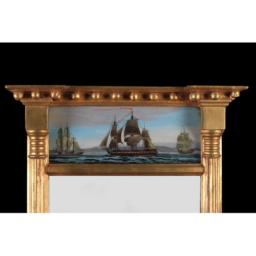 486 - A REGENCY STYLE GILDED PIER GLASS with indented breakfront cornice applied spheres, rectangular reve... 