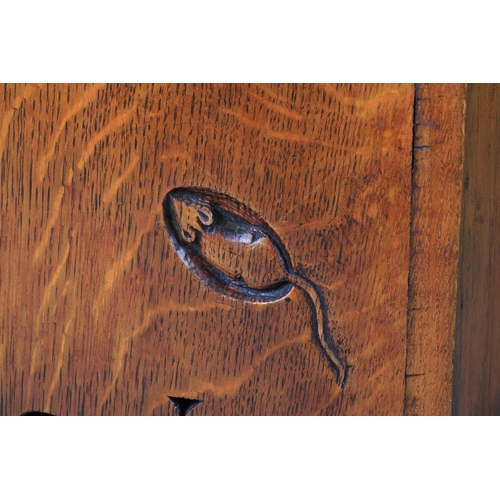 499 - A THOMPSON OF KILBURN 'MOUSEMAN' OAK WASTEPAPER BIN c.1920/30'S having an inwardly curved top carved... 