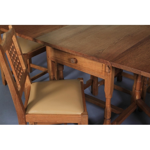 502 - A COLIN ALMACK SUTTON-UNDER-WHITESTONECLIFFE 'BEAVERMAN' oak gateleg dining table having twin drop l... 