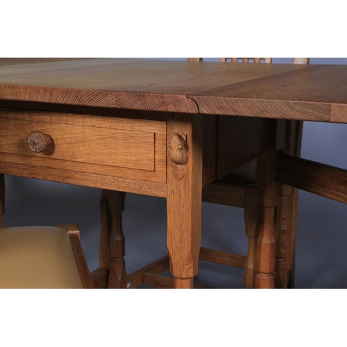 502 - A COLIN ALMACK SUTTON-UNDER-WHITESTONECLIFFE 'BEAVERMAN' oak gateleg dining table having twin drop l... 