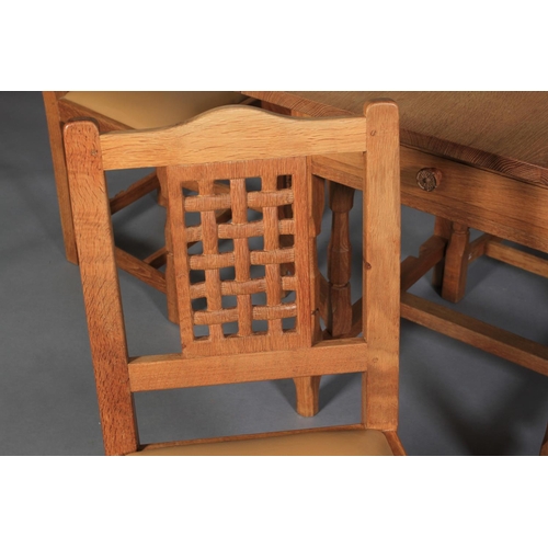 502 - A COLIN ALMACK SUTTON-UNDER-WHITESTONECLIFFE 'BEAVERMAN' oak gateleg dining table having twin drop l... 