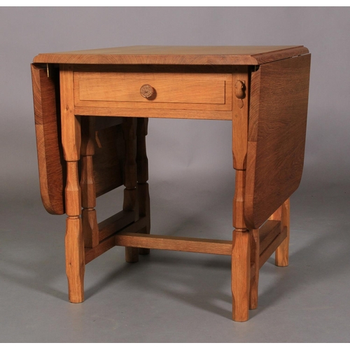 502 - A COLIN ALMACK SUTTON-UNDER-WHITESTONECLIFFE 'BEAVERMAN' oak gateleg dining table having twin drop l... 