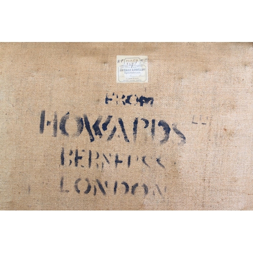 507 - HOWARD & SONS, BERNERS ST, LONDON - a three seater sofa and pair of armchairs, all on mahogany squar... 