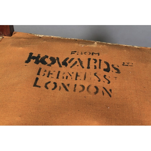 507 - HOWARD & SONS, BERNERS ST, LONDON - a three seater sofa and pair of armchairs, all on mahogany squar... 