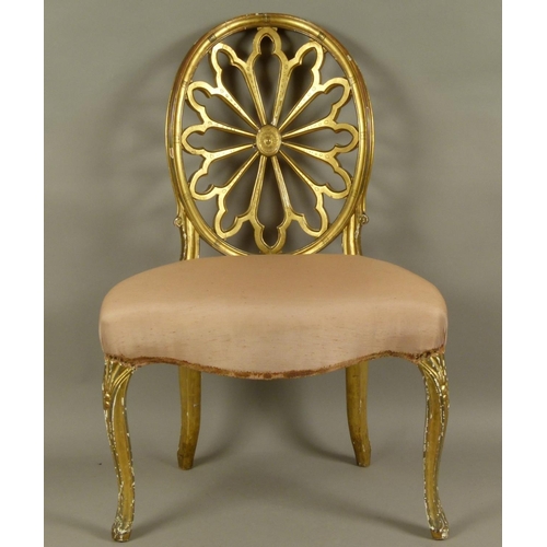 511 - A GEORGE III GILTWOOD SINGLE CHAIR in Robert Adam style, the concave oval back finely pierced and ca... 