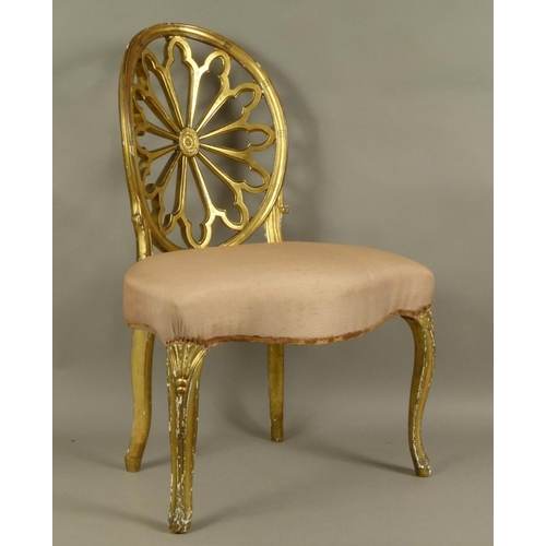 511 - A GEORGE III GILTWOOD SINGLE CHAIR in Robert Adam style, the concave oval back finely pierced and ca... 