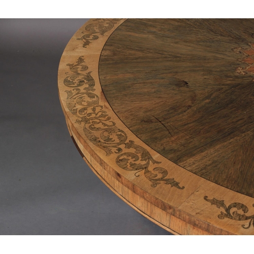 515 - AN EARLY VICTORIAN ROSEWOOD VENEERED CIRCULAR BREAKFAST TABLE, the segmented top with foliate arched... 