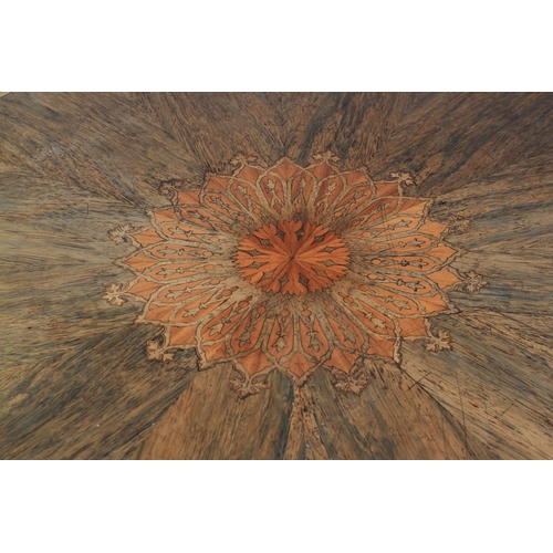 515 - AN EARLY VICTORIAN ROSEWOOD VENEERED CIRCULAR BREAKFAST TABLE, the segmented top with foliate arched... 