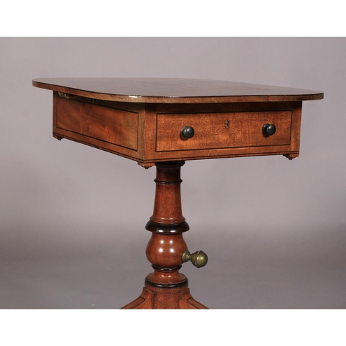 529 - A REGENCY MAHOGANY READING TABLE line inlaid throughout with ebony stringing, the rounded oblong top... 