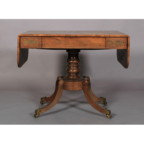 530 - A REGENCY ROSEWOOD SOFA TABLE, having twin drop leaves, beaded flush frieze drawer and opposing dumm... 