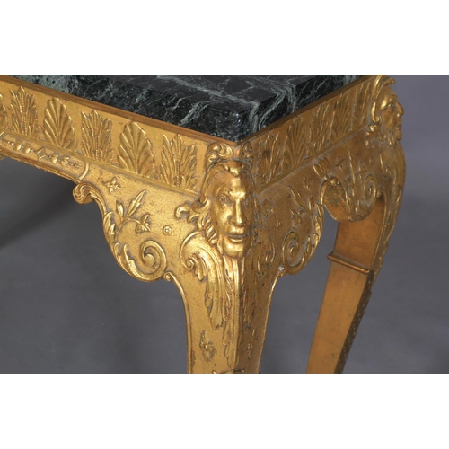 534 - AN OLD REPRODUCTION GILTWOOD SIDE TABLE in the style of William Kent, the verde amtico marble top ab... 