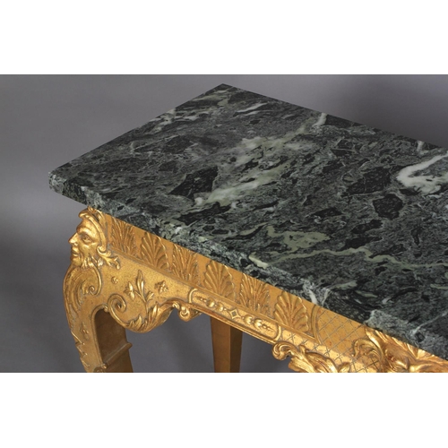 534 - AN OLD REPRODUCTION GILTWOOD SIDE TABLE in the style of William Kent, the verde amtico marble top ab... 