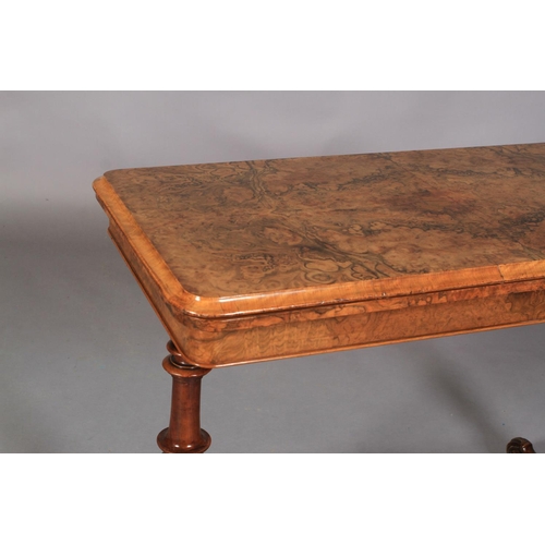 535 - A VICTORIAN BURR WALNUT VENEERED CARD TABLE of rounded rectangular form, the folding top quarter ven... 