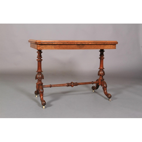 535 - A VICTORIAN BURR WALNUT VENEERED CARD TABLE of rounded rectangular form, the folding top quarter ven... 