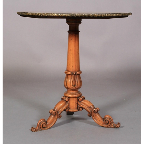 536 - AN EARLY VICTORIAN WALNUT TABLE, the circular segmental veneered top with applied gilt and floral ma... 