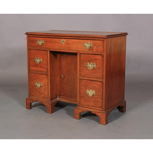 542 - A GEORGE III MAHOGANY KNEEHOLE DESK, the rectangular top with applied moulded lip above one long dra... 