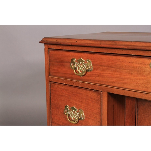 542 - A GEORGE III MAHOGANY KNEEHOLE DESK, the rectangular top with applied moulded lip above one long dra... 