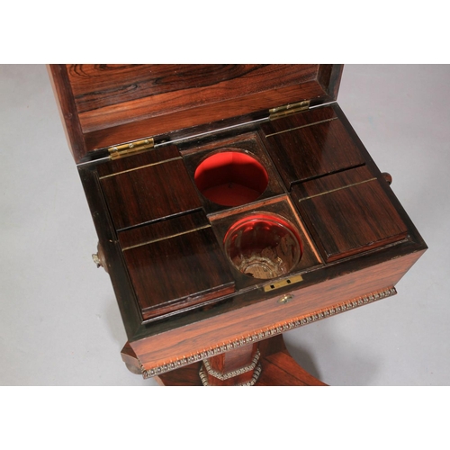 544 - A REGENCY ROSEWOOD VENEERED TEAPOY of conventional form, the sarcophagus shaped top with reel mouldi... 