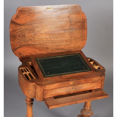 551 - A VICTORIAN WALNUT VENEERED WORK TABLE, of rounded rectangular form, the hinged lid revealing green ... 