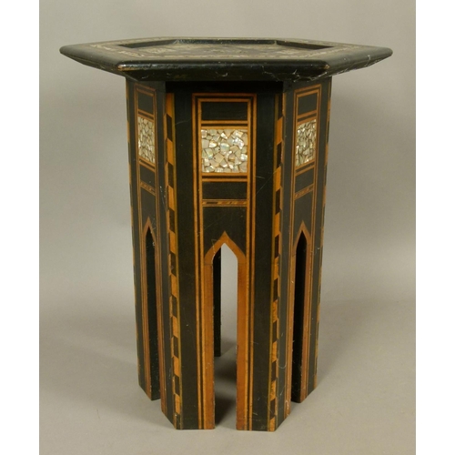 554 - A SYRIAN MOTHER OF PEARL INLAID EBONISED OCCASIONAL TABLE, the hexagonal top with star within a fram... 