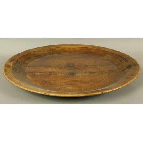 559 - A LATE 18TH/EARLY 19TH CENTURY SYCAMORE SHALLOW CIRCULAR BOWL with groove carved rim, 73cm diameter ... 