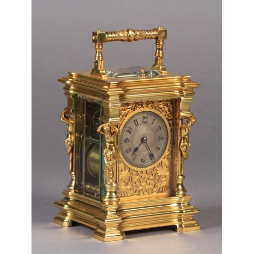 56 - A LATE 19TH CENTURY BRASS CASED HOUR REPEATING CARRIAGE CLOCK, the case cast with male bearded carya... 