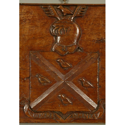 563 - A PAIR OF 19TH CENTURY OAK ARMORIAL carved rectangular panels each with a filled shield and crest, 3... 