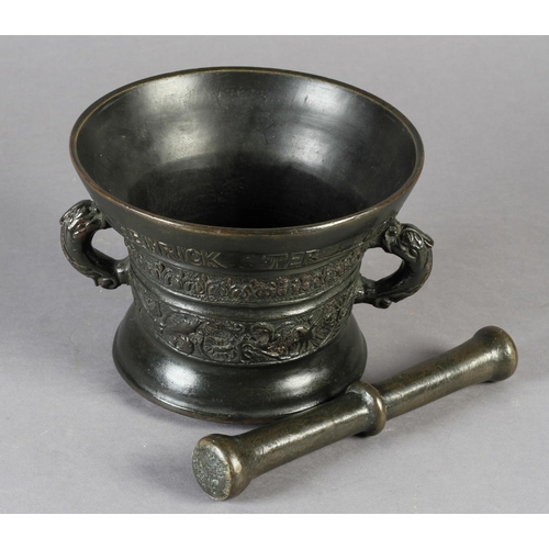 565 - A 17TH CENTURY DUTCH BRONZE PESTLE AND MORTAR of flared cylindrical form, the upper rim inscribed: H... 