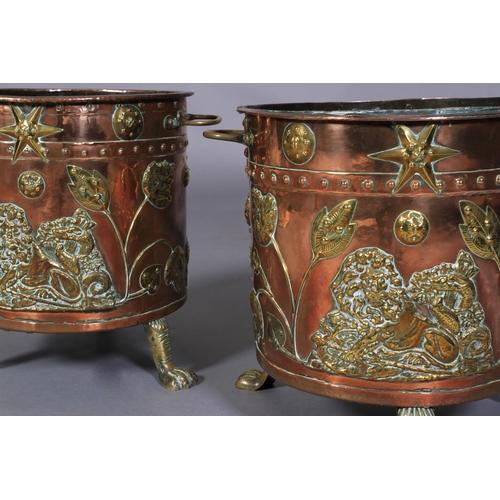 569 - A PAIR OF VICTORIAN TWO HANDLED COPPER CYLINDRICAL COAL BINS, the seamed bodies applied with lion an... 