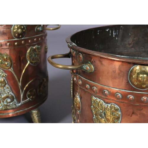 569 - A PAIR OF VICTORIAN TWO HANDLED COPPER CYLINDRICAL COAL BINS, the seamed bodies applied with lion an... 