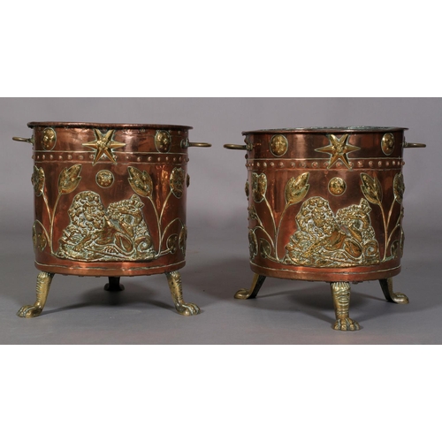 569 - A PAIR OF VICTORIAN TWO HANDLED COPPER CYLINDRICAL COAL BINS, the seamed bodies applied with lion an... 